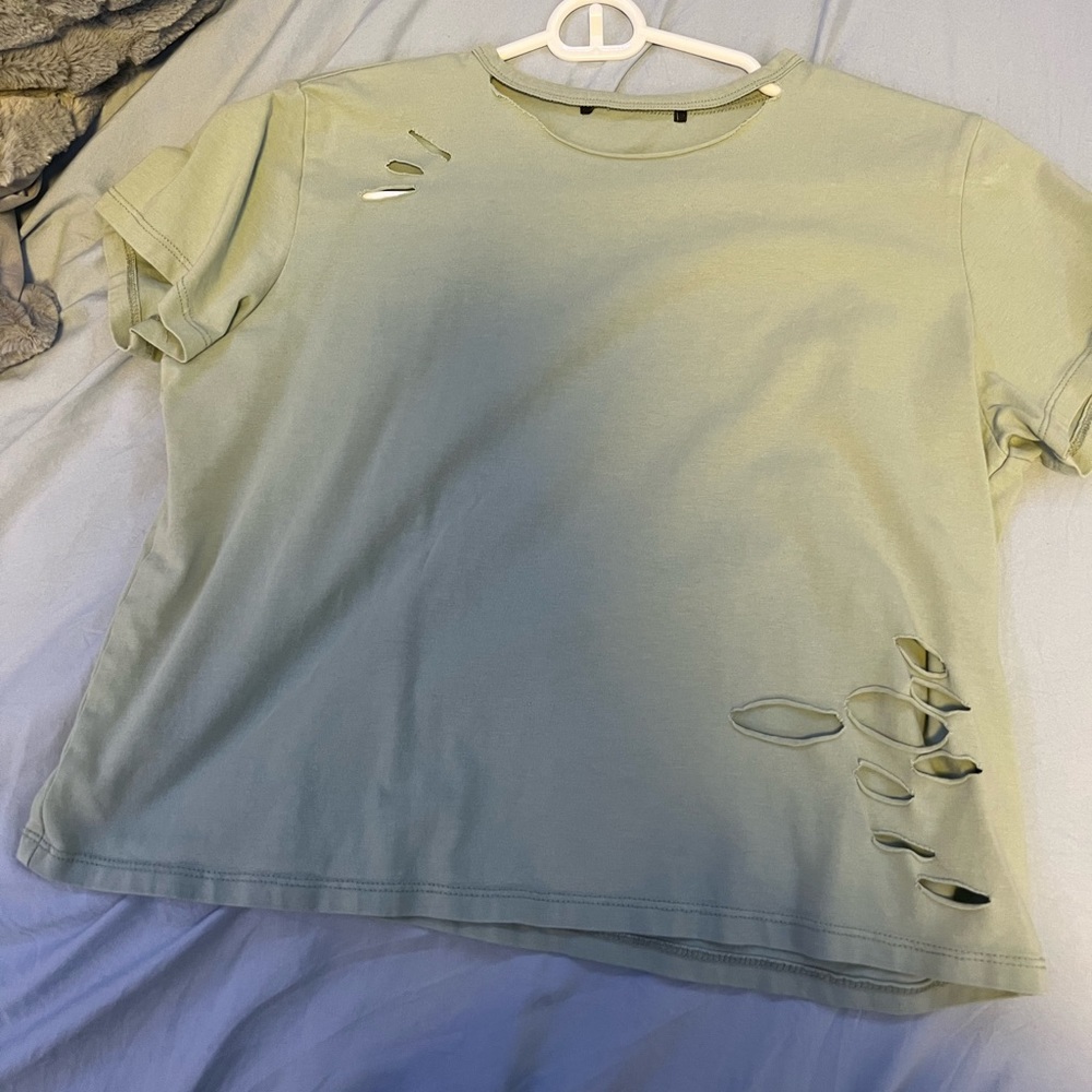 Green ripped shirt